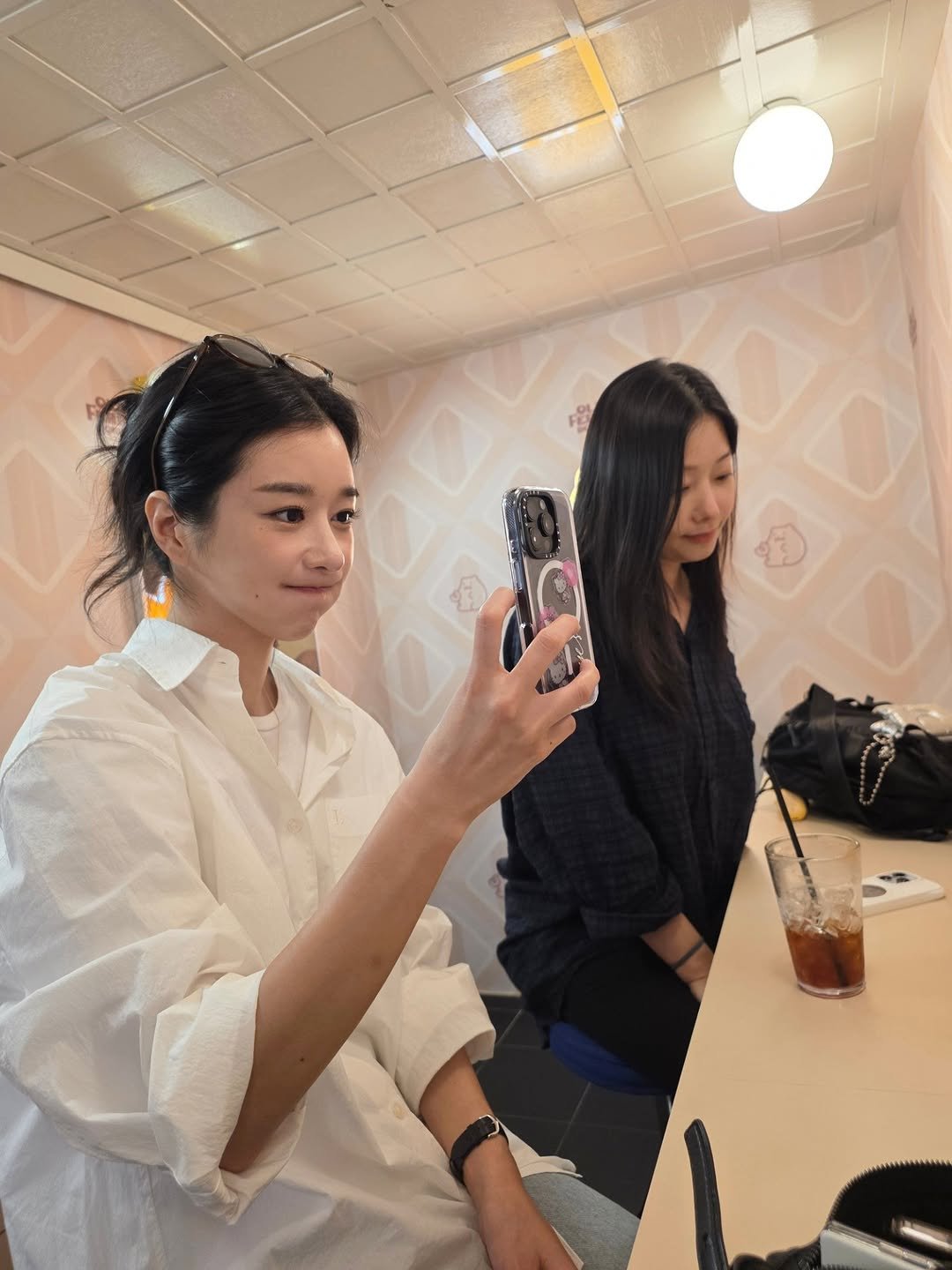Photo by SEO YEA JI on April 18, 2026. May be a selfie of one or more people, braids, makeup, mirror, cornflower and text.