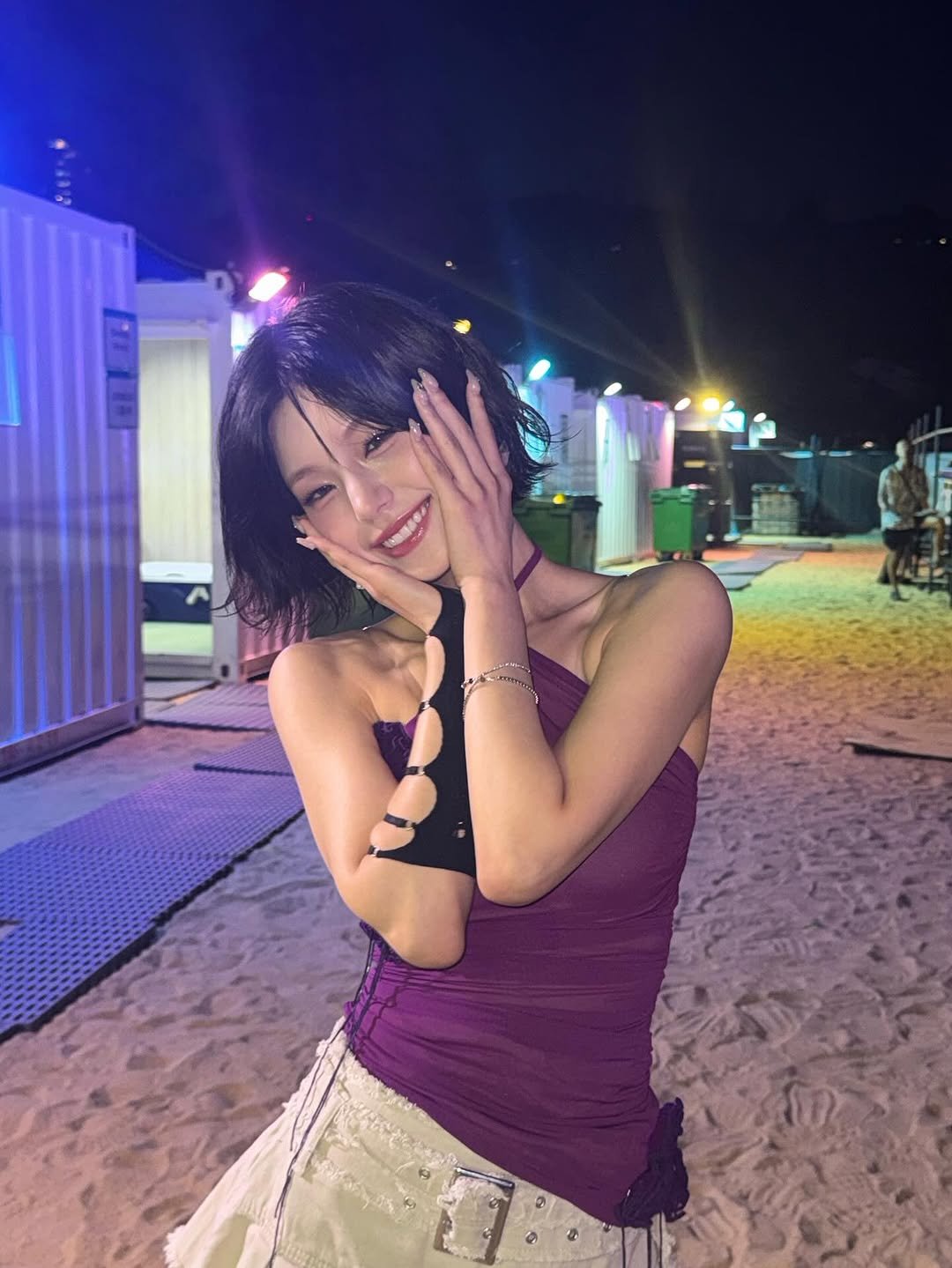 Photo by YEJI on July 07, 2025. May be an image of 2 people, hair, top, beach and text.