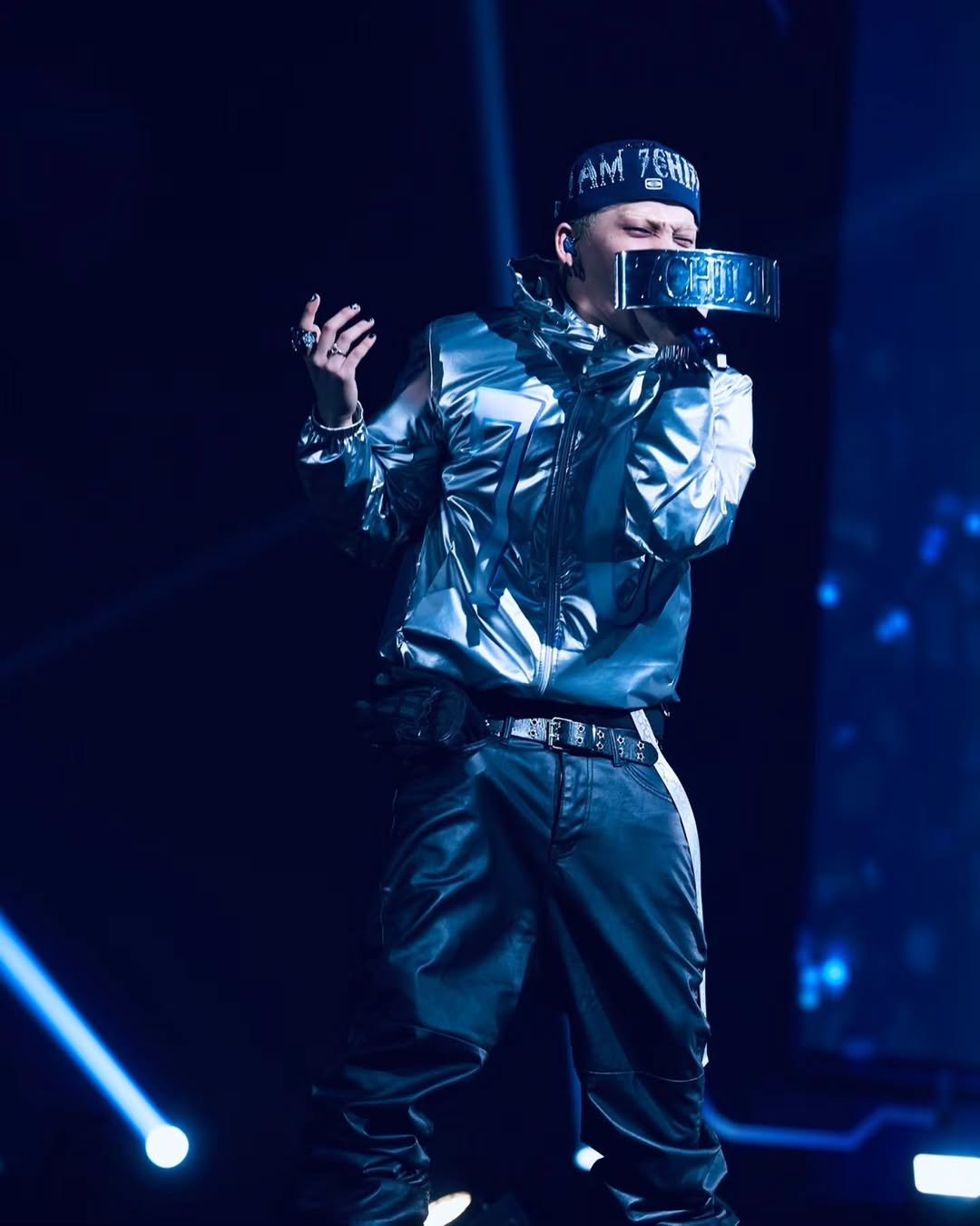 Photo by TREASURE (트레저) on January 11, 2026. May be an image of one or more people, bangs, bandanna, top, concert and text.