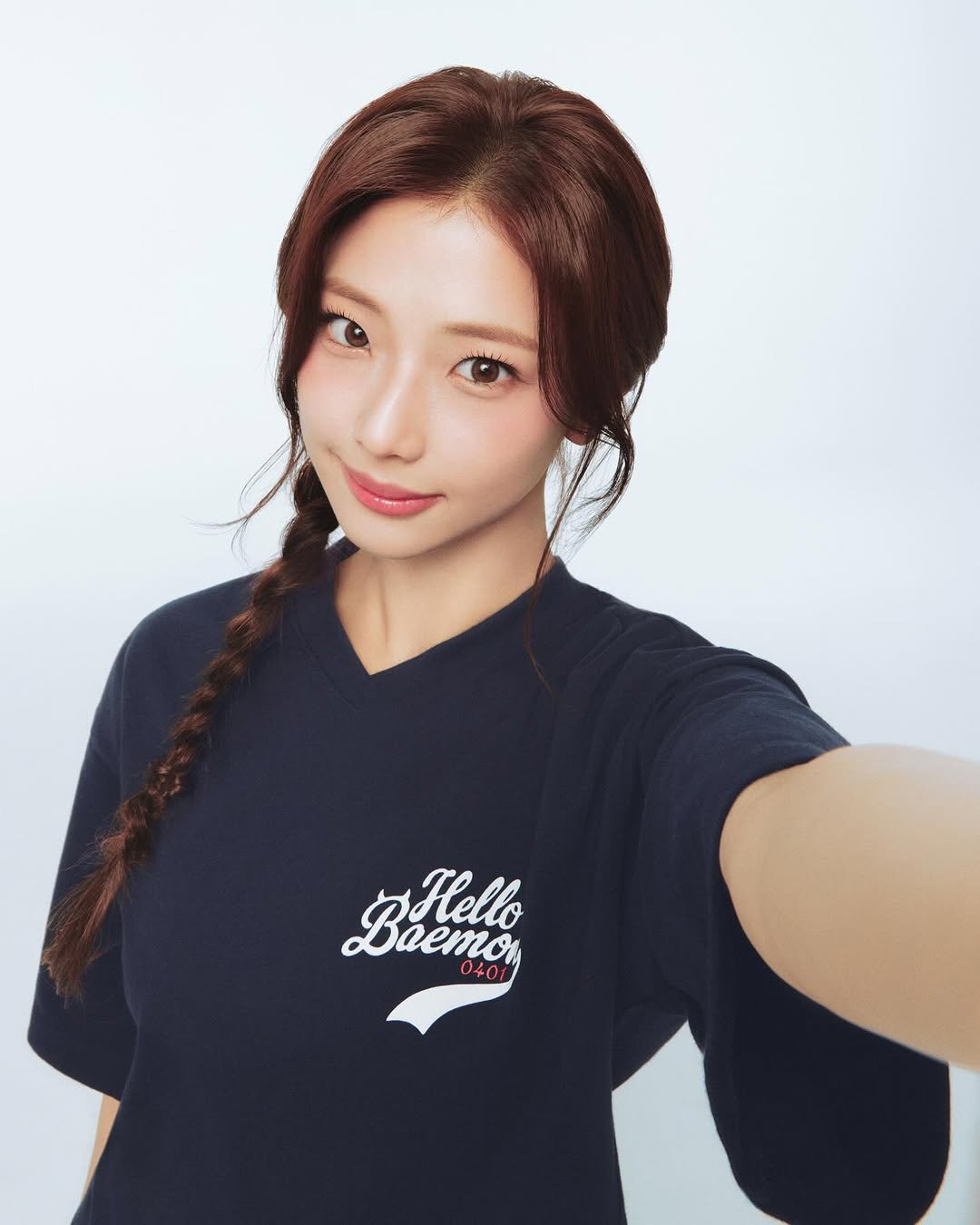 Photo shared by UNIQLO UT on February 02, 2026 tagging @ygad_official. May be an image of one or more people, braids, top and text that says 'BaeToH prello Hello 0401'.