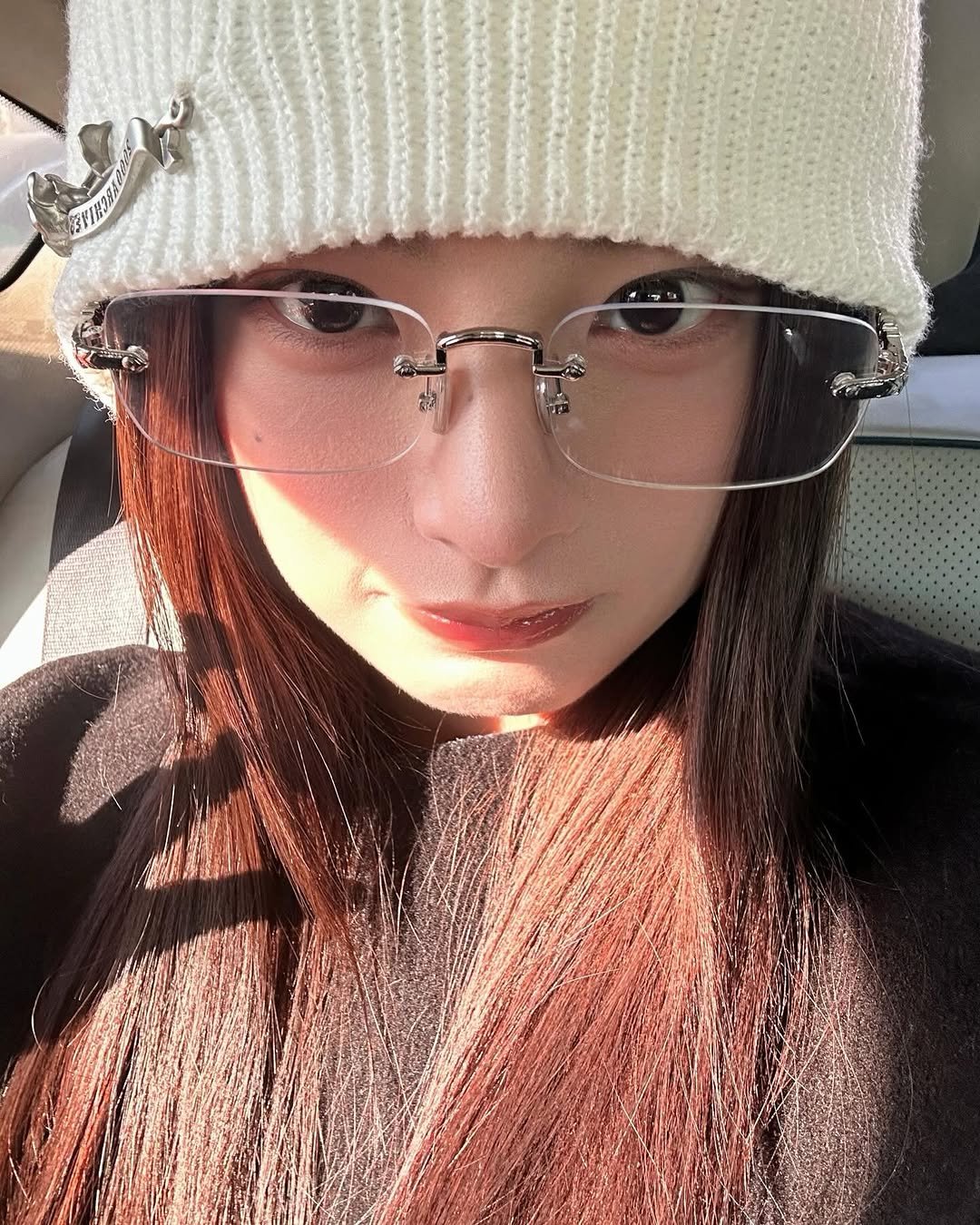 Photo by YIREN on February 11, 2026. May be a selfie of one or more people, hair, eyeglasses, duffle coat, hat, beret, parka, face mask, turtleneck and text.