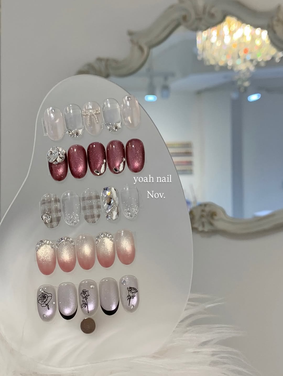 Photo by 청량리 요아네일 on October 29, 2025. May be an image of one or more people, fingernails and text that says '00000 yoahnail yoah nail T009U Nov. Nov. .0000 ០រ០'.