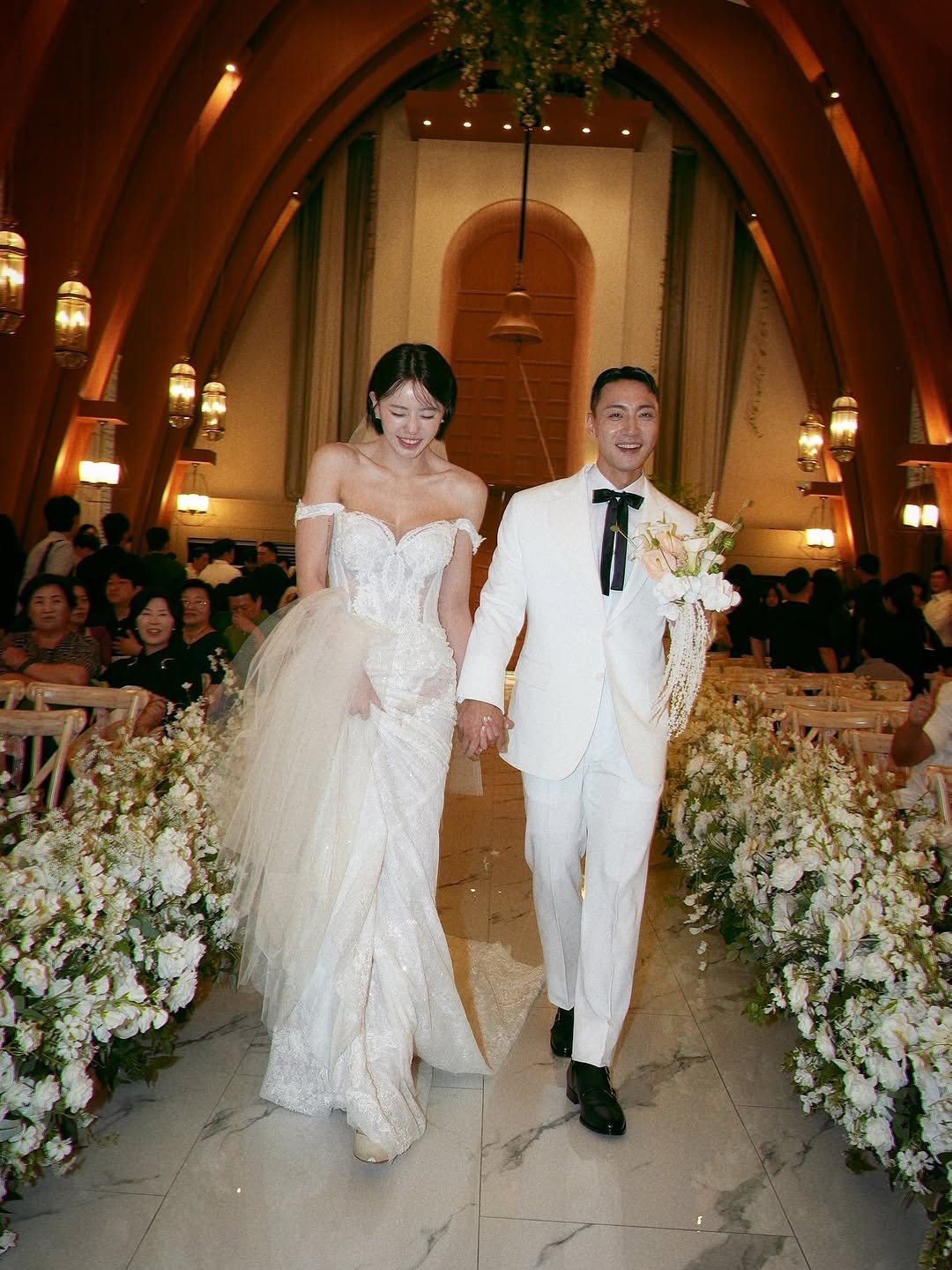 Photo shared by 💎H💎 on August 08, 2025 tagging @classic_jwon, @official_elevato, @stellademarie_official, @lightthat_official, @bellaluce_seoul, and @healyo__couple. May be an image of 11 people, gown, wedding and text.