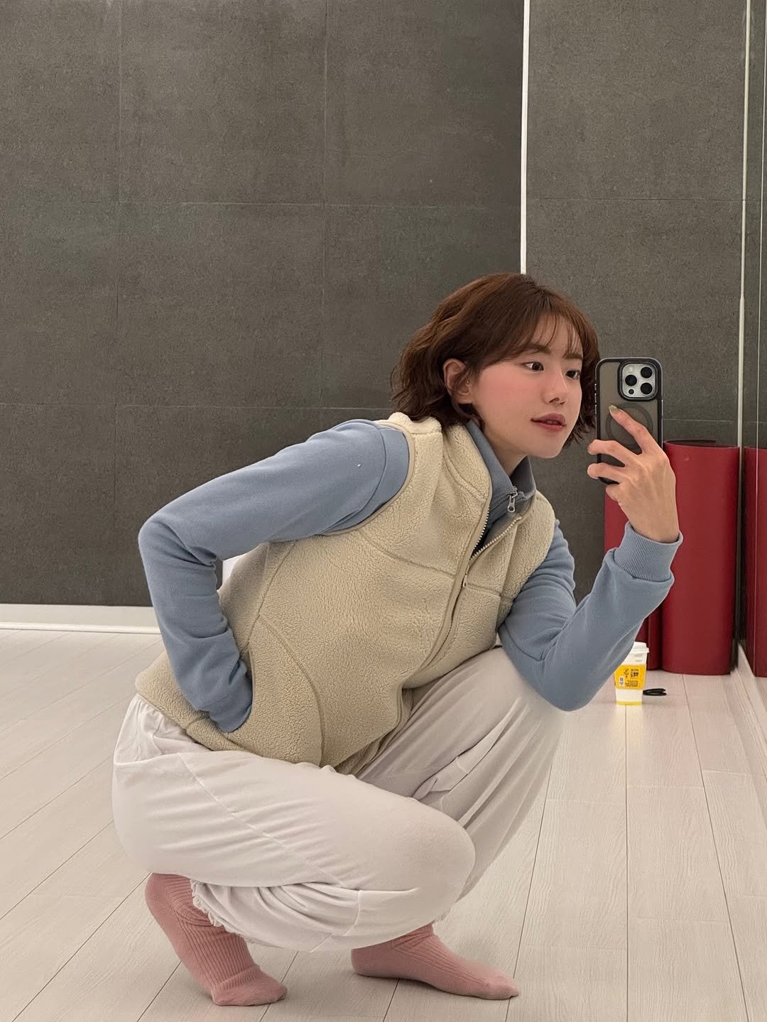 Photo by 💎H💎 on November 25, 2025. May be an image of mirror, sweatpants, turtleneck and text.