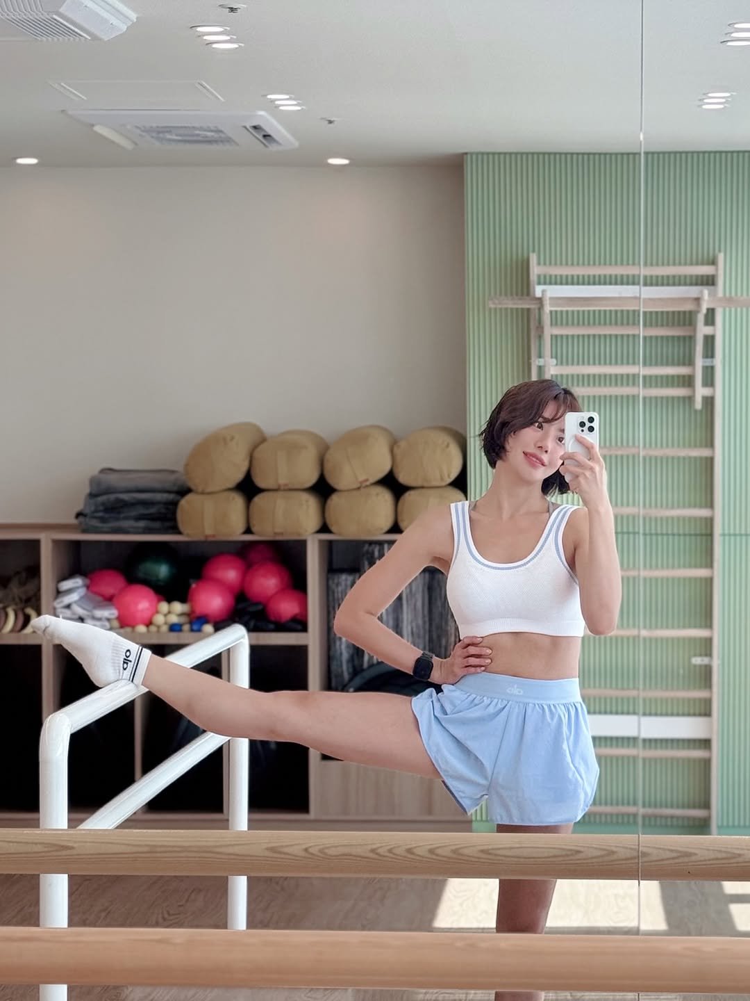 Photo shared by 💎H💎 on September 21, 2025 tagging @alo, @umnada_studio, and @aloseoul. May be an image of 1 person, dancing, practicing yoga, activewear, car and text.