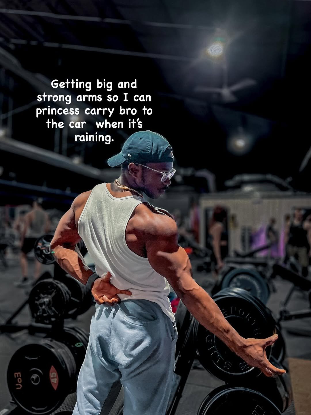 Photo by Jeremy koko on December 28, 2025. May be an image of one or more people, biceps, people bodybuilding, dumbbell, poster and text that says 'Getting big and strong arms so I can princess carry princesscarrybro bro to the car when it's raining.'.