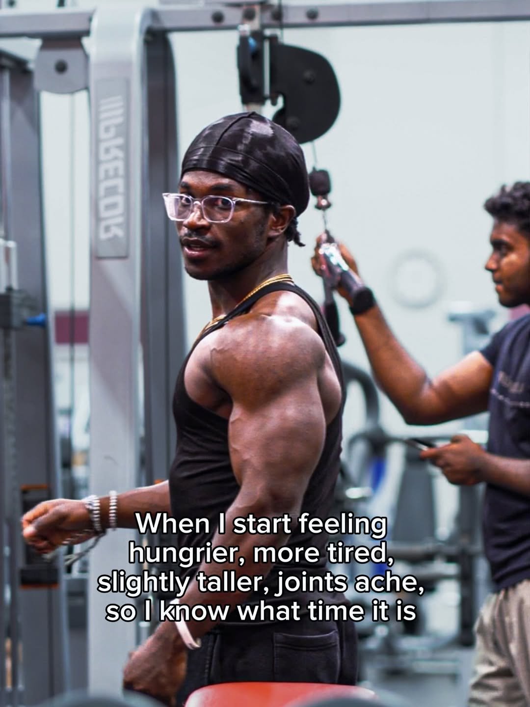 Photo by Jeremy koko on January 08, 2026. May be an image of one or more people, biceps, people bodybuilding, activewear and text that says 'ምዐጋይያግ!!! When start feeling hungrier, more tired, slightly taller, joints ache, so Sol I know what time itis is it'.
