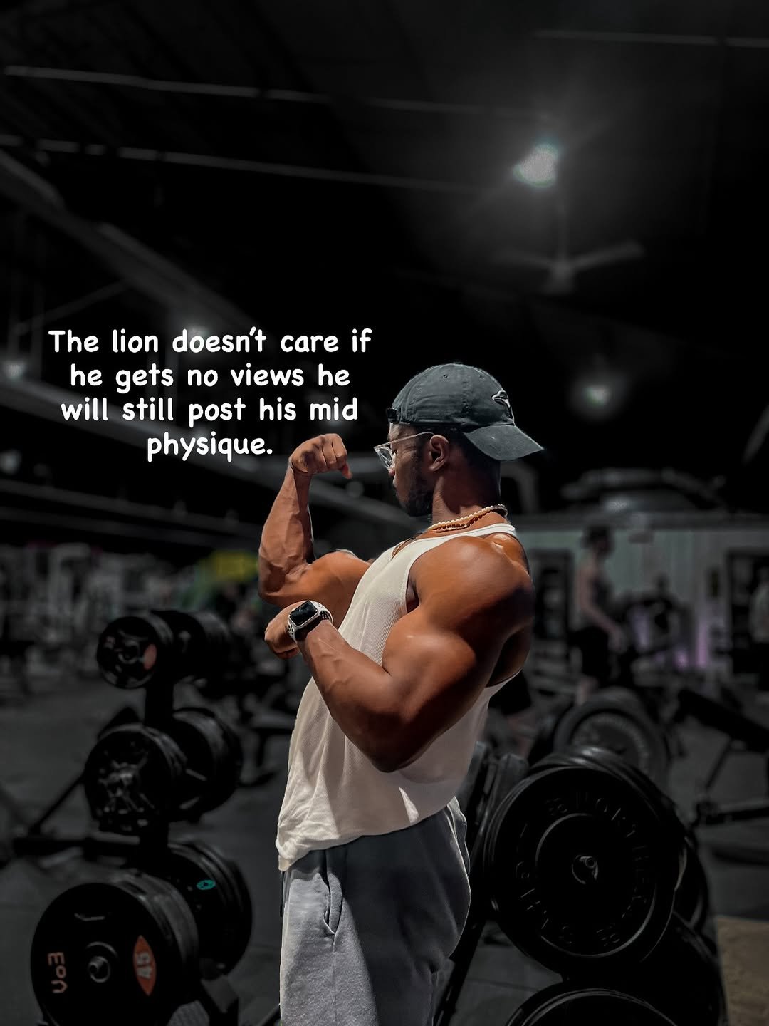 Photo by Jeremy koko on January 10, 2026. May be an image of one or more people, biceps, people bodybuilding and text that says 'The lion doesn't care if he gets no views he will still post his mid physique.'.