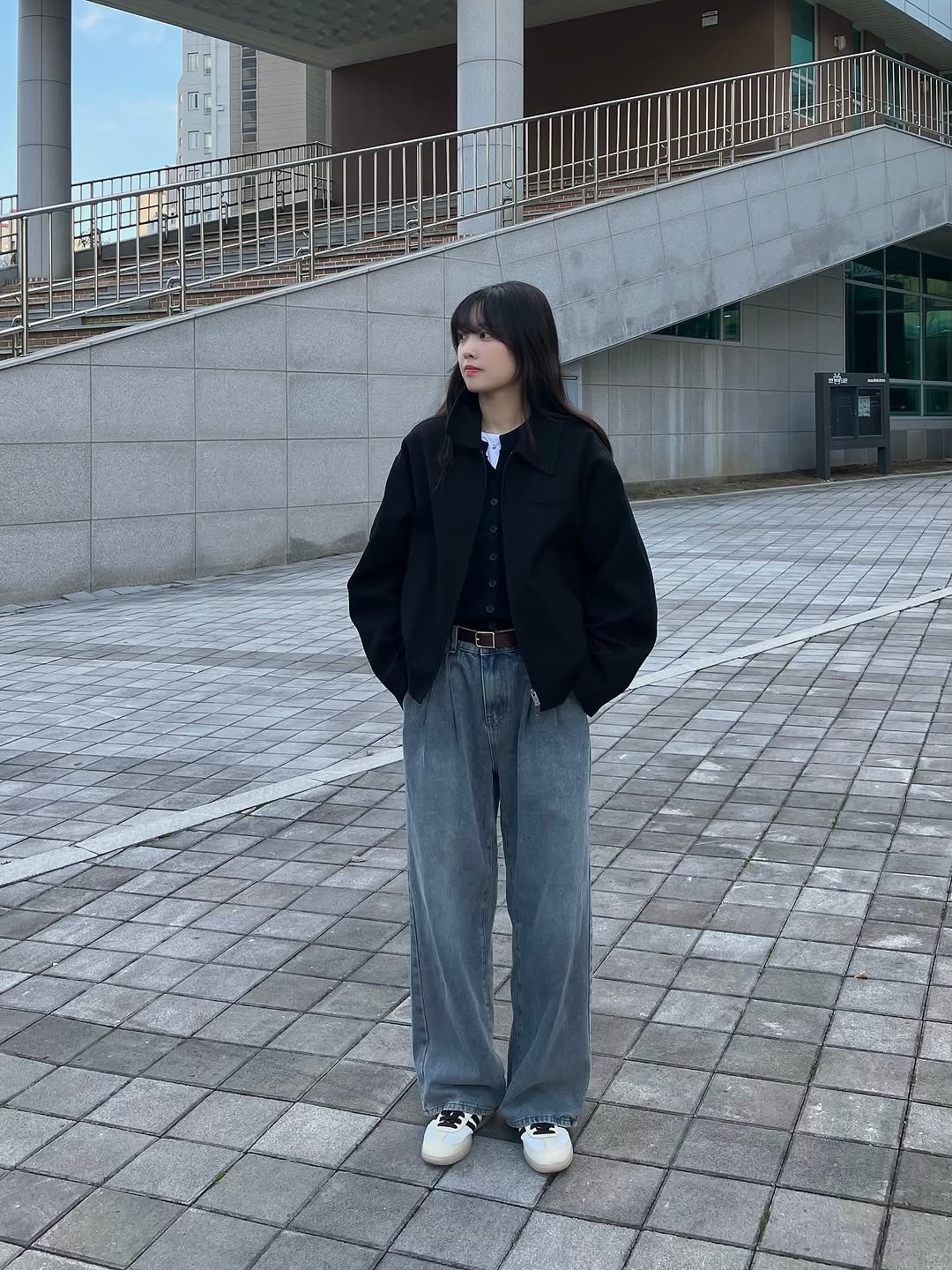 Photo shared by 유희 on October 31, 2025 tagging @originals_kr. May be an image of duffle coat, overcoat, parka, sweatpants and text.