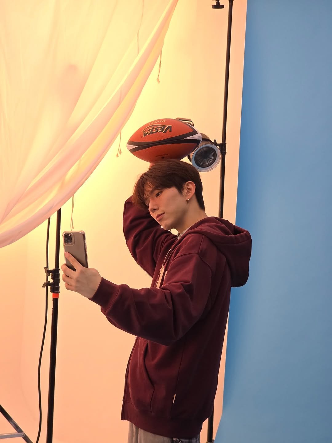 Photo by 기현 Kihyun on October 07, 2025. May be an image of phone, camera and tripod.