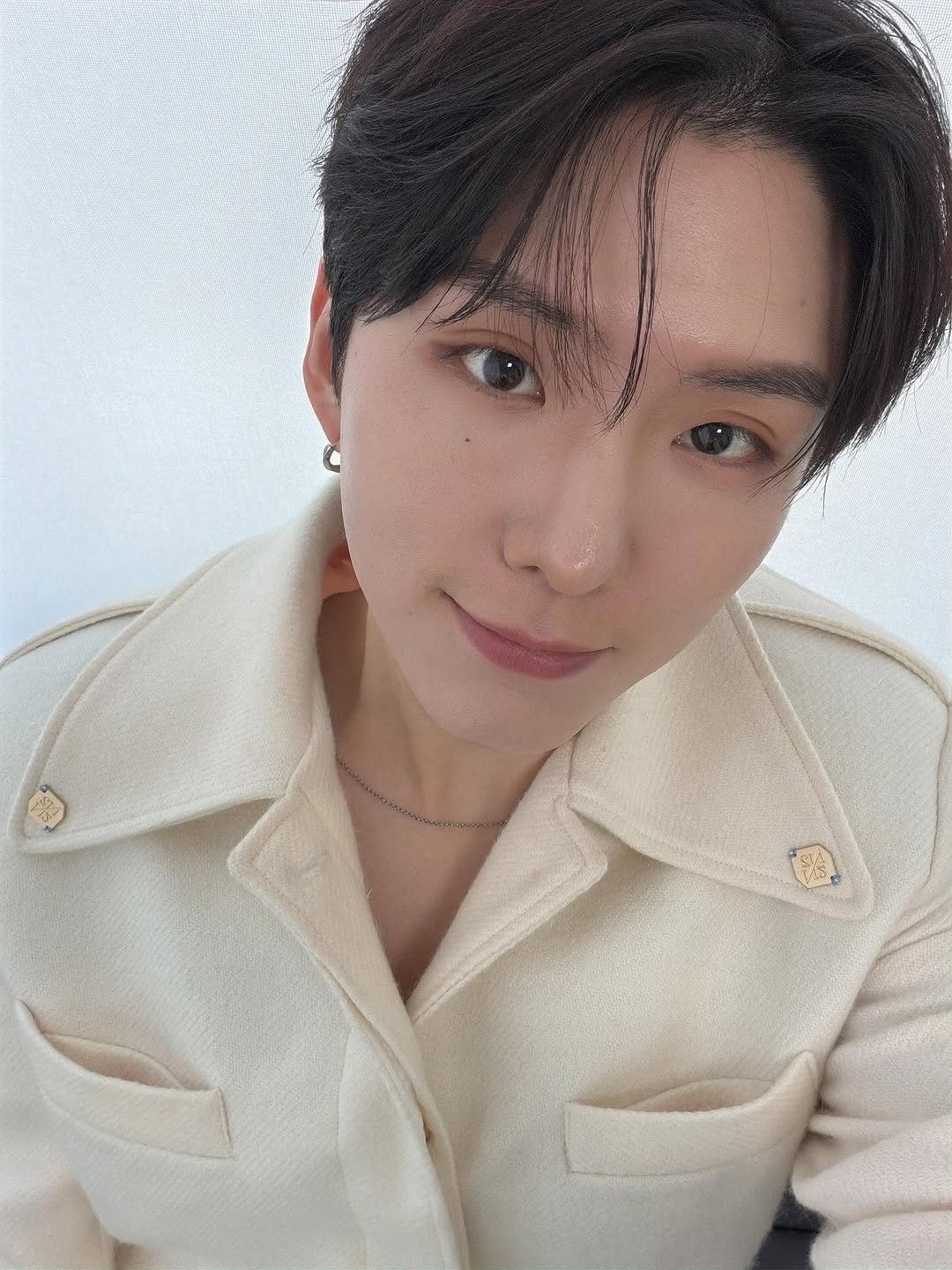 Photo by 기현 Kihyun on November 11, 2025. May be an image of bolo tie and text.