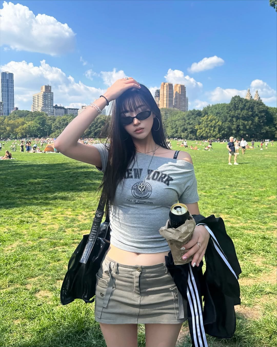 Photo shared by 최윤또 on September 18, 2025 tagging @centralparknyc. May be an image of 5 people, miniskirt, park and text.