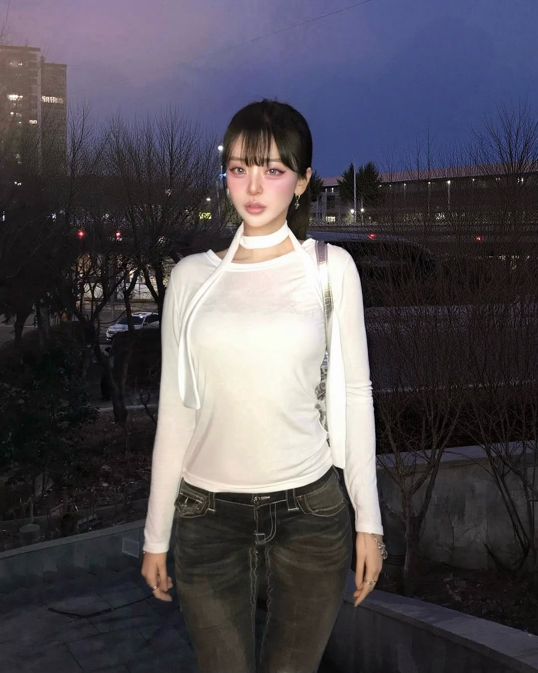 Photo shared by 최윤또 on February 16, 2026 tagging @havism_official. May be an image of one or more people, makeup, people standing, turtleneck, choker and text.