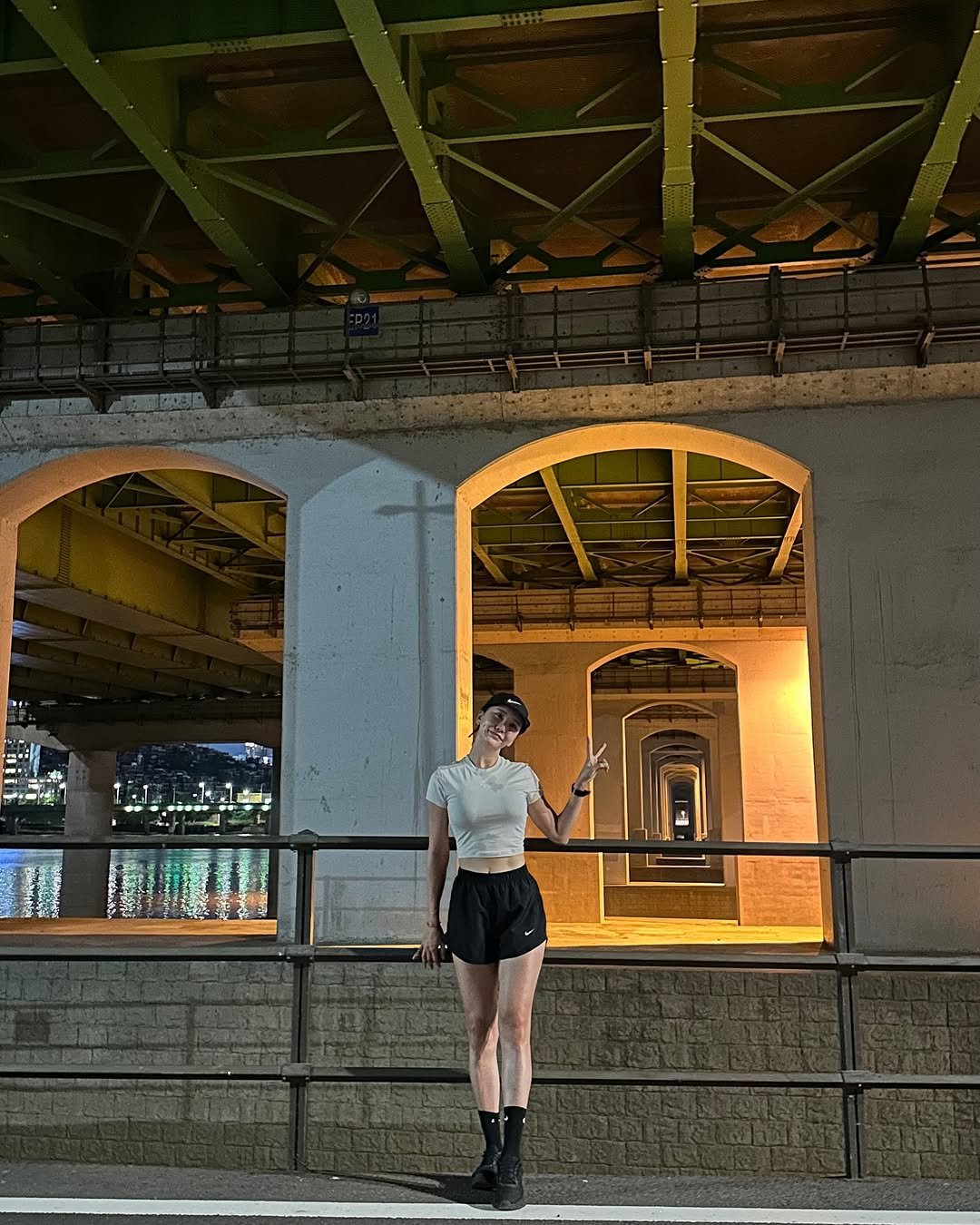 Photo shared by 𝘊𝘩𝘰𝘪 𝘠𝘰𝘰𝘯 𝘚𝘦𝘰 on July 24, 2025 tagging @nike, and @on. May be an image of 1 person, standing, bridge and text.