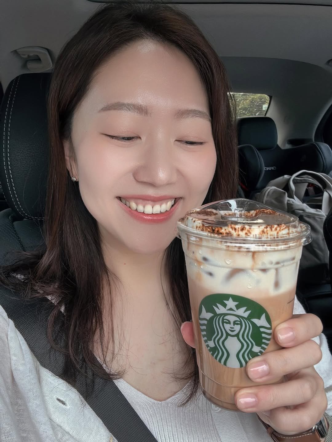 Photo by 유트루 on September 15, 2025. May be an image of 1 person, drink and text.