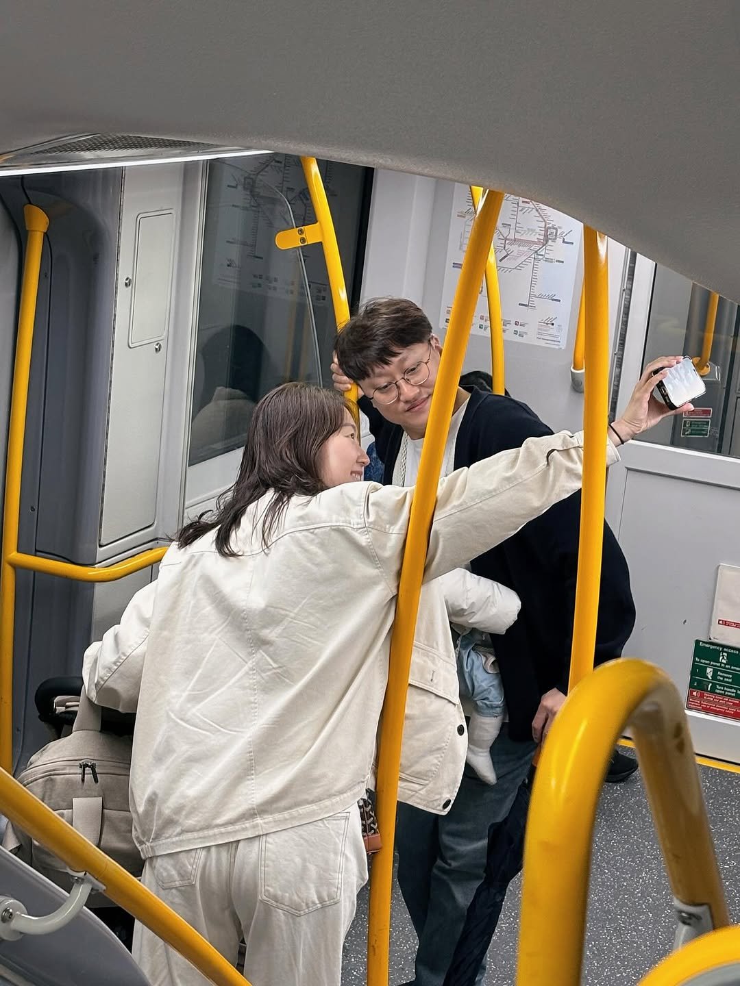 Photo by 유트루 on August 03, 2025. May be an image of 2 people, turnstile, bus and text.
