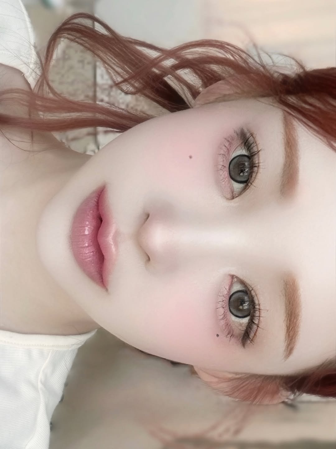 Photo by 유앤아인 on May 09, 2025. May be a closeup of 1 person, eyeliner, makeup, hair, lipstick and text.