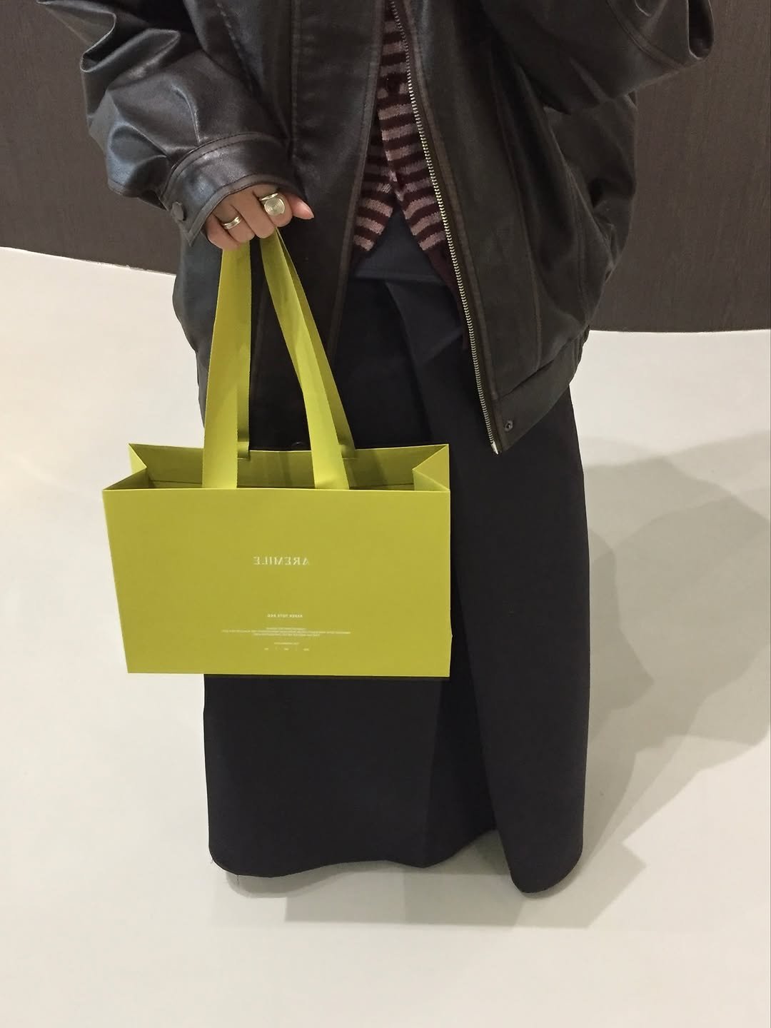 Photo shared by 유빈 on November 15, 2025 tagging @aremileofficial. May be an image of purse and text.