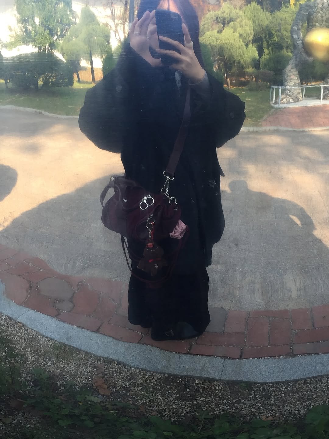 Photo shared by 유빈 on November 12, 2025 tagging @fillintheblank_fitb. May be an image of mirror, cloak and text.