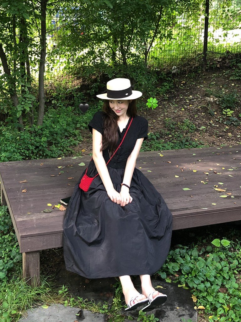 Photo shared by 유나브 • 윰🍡 on July 30, 2025 tagging @younav.official. May be an image of 1 person, parasol, bowler hat and text.