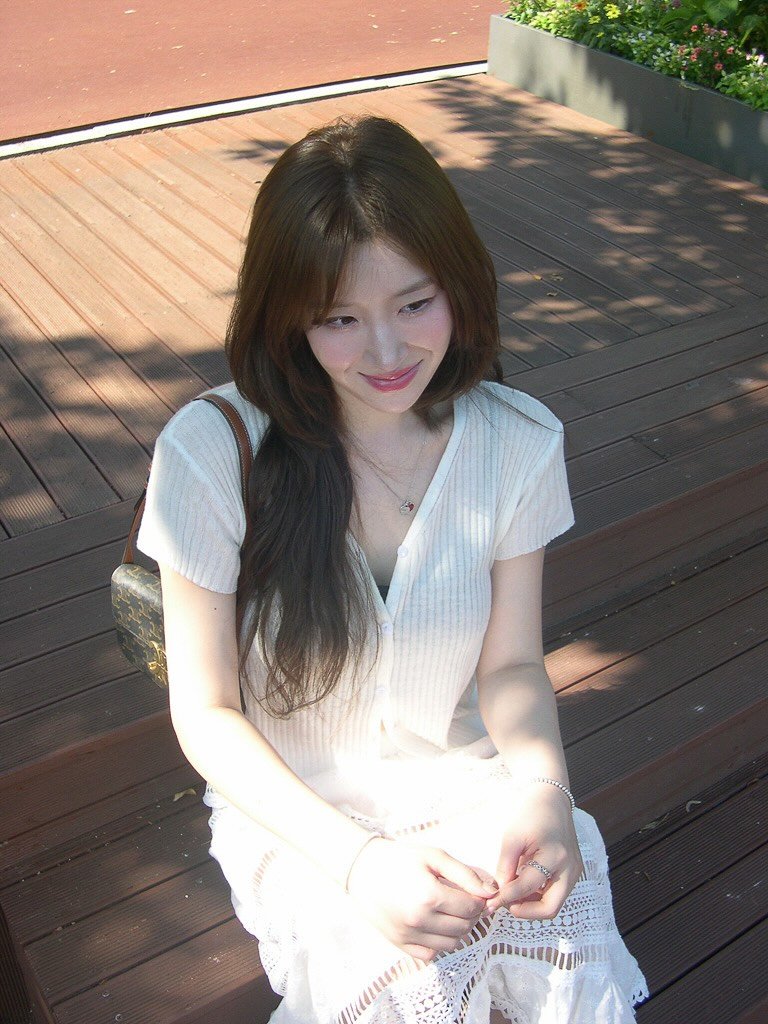 Photo by 유나브 • 윰🍡 on July 23, 2025. May be an image of 1 person, hair, sundress, outdoors and text.