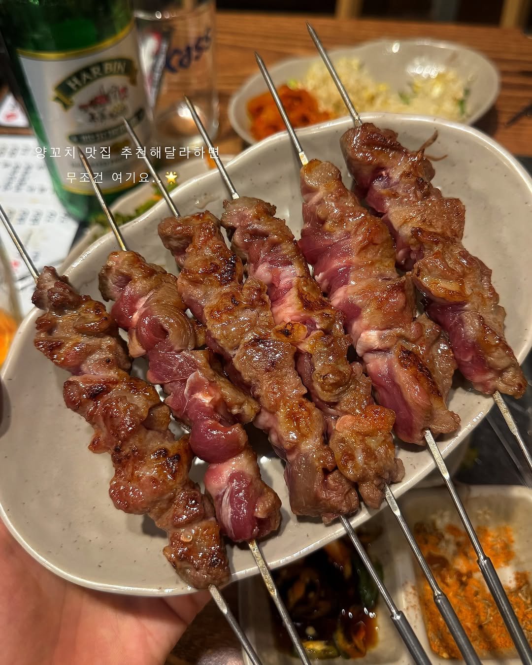 Photo by 하또먹 on October 26, 2025. May be an image of steak, beef, skewer, pork and text.
