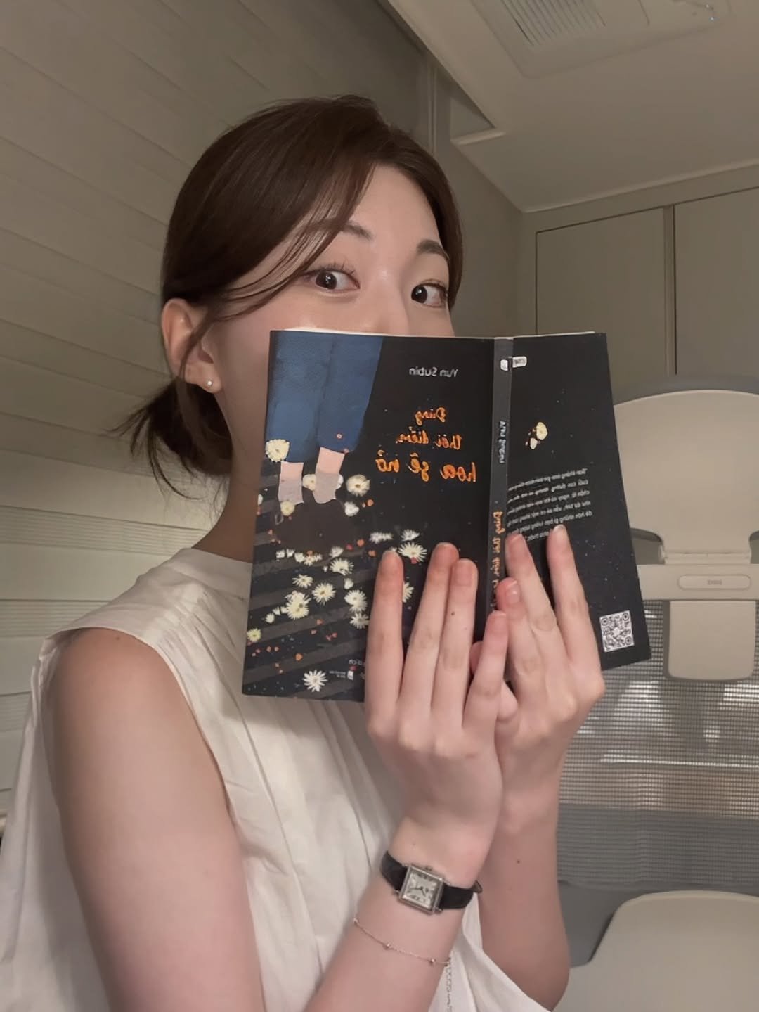 Photo by 윤수빈 (유어셀린) on August 08, 2025. May be an image of 1 person, book and text.