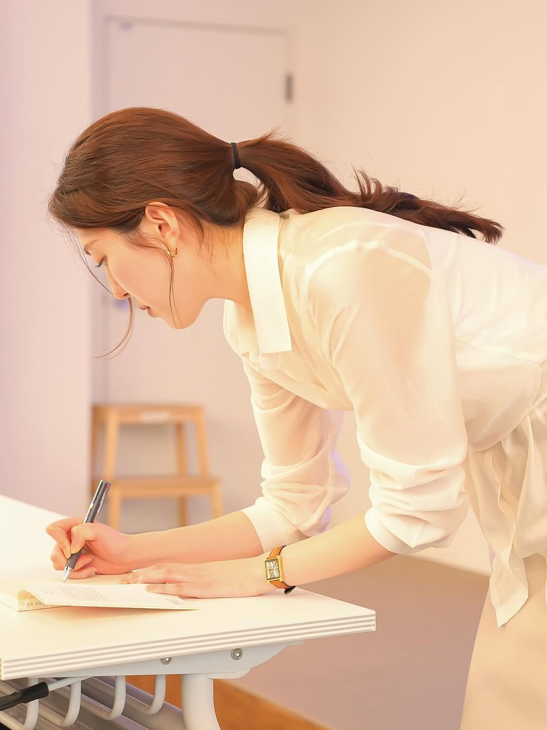 Photo by 윤수빈 (유어셀린) on September 10, 2025. May be an image of 1 person, studying, bureau, pen, clipboard, desk, office and text.