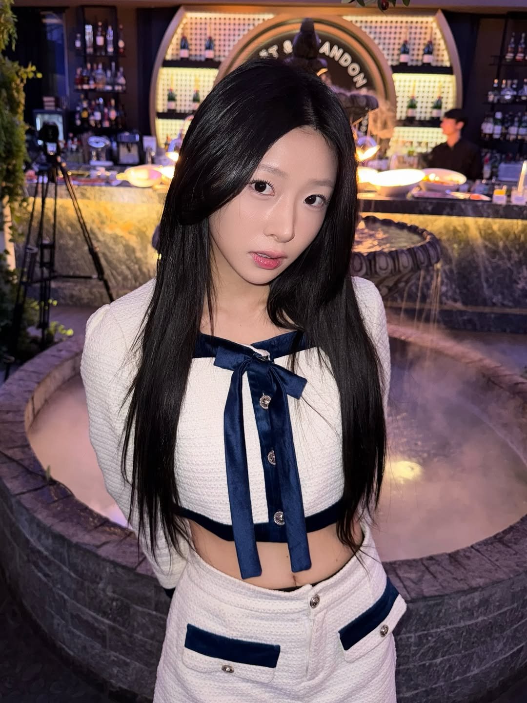 Photo by 혜다 on December 19, 2025. May be an image of one or more people, hair, top, bra, miniskirt and text.