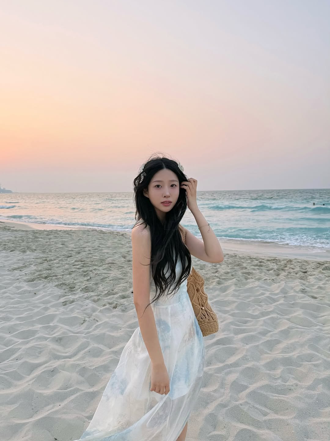 Photo by 혜다 on November 05, 2025. May be an image of headdress, dress, ocean and text.