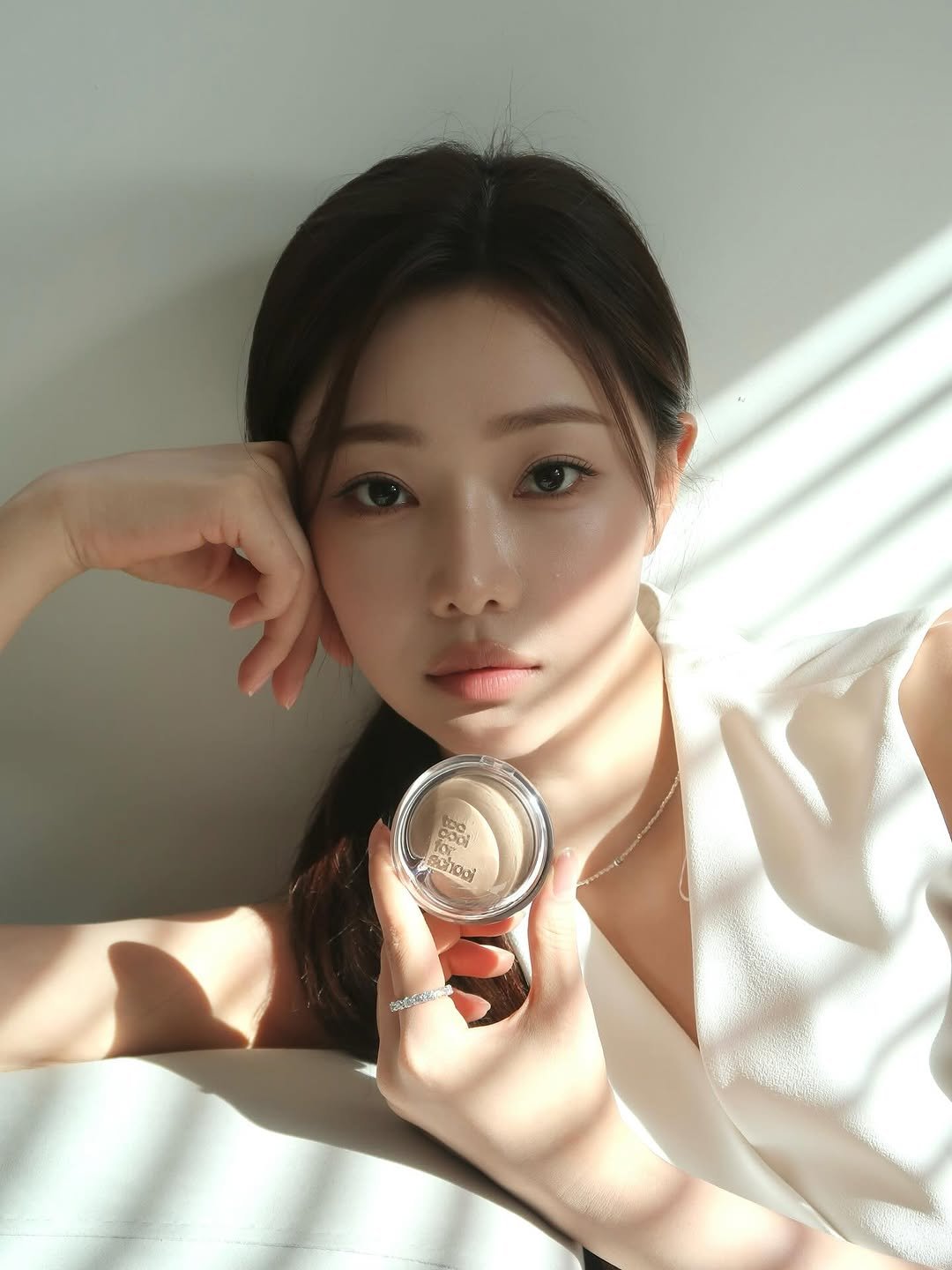 Photo shared by 이시안  ʟᴇᴇ sɪᴀɴ on September 03, 2025 tagging @toocoolforschool_official. May be an image of 1 person, makeup, lipstick, hand cream and text.