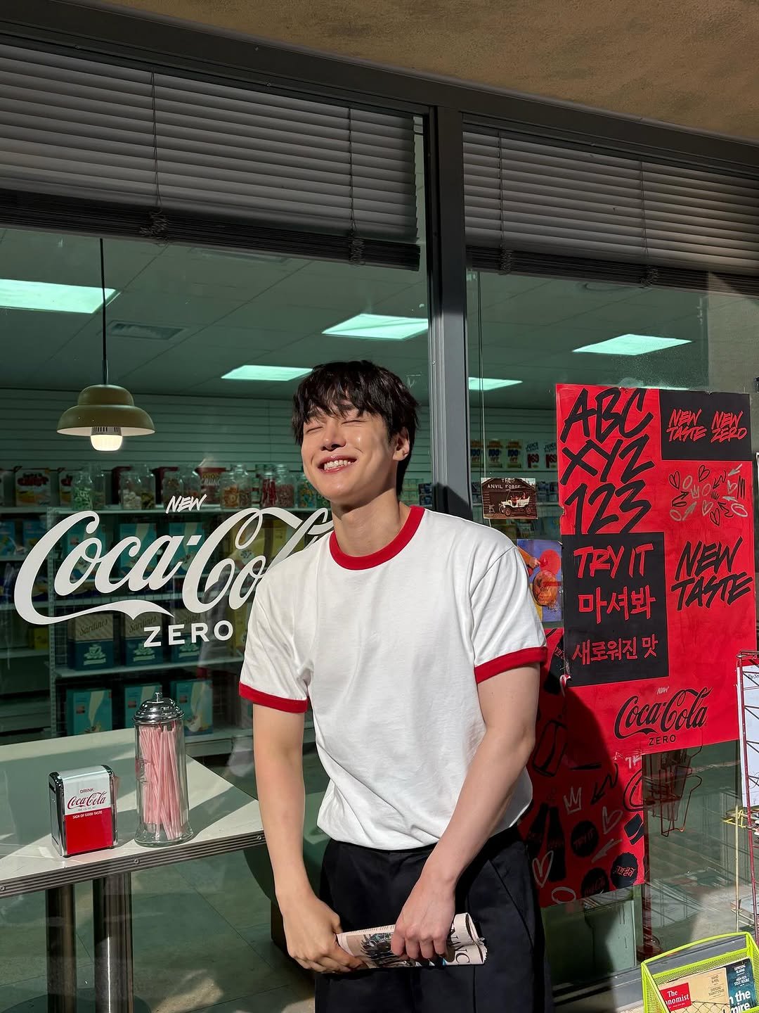 Photo shared by 강유석 you seok kang on July 04, 2025 tagging @cocacola_korea. May be an image of 1 person and text that says 'CcaCo NEN ZERO ABO 幸運 NEW TAYTE لم 笑 ارل TRY IT NEW 마셔봐 ΤΑΣ 새로위진맛 CocaCola ZERO CicaCela EUEA the'.