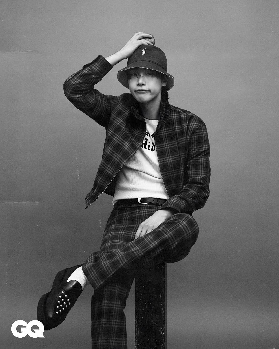Photo shared by 강유석 you seok kang on June 14, 2025 tagging @kimheejune, and @f22lmin. May be a black-and-white image of one or more people, bangs, top, outerwear, bolo tie and text that says 'GQ'.