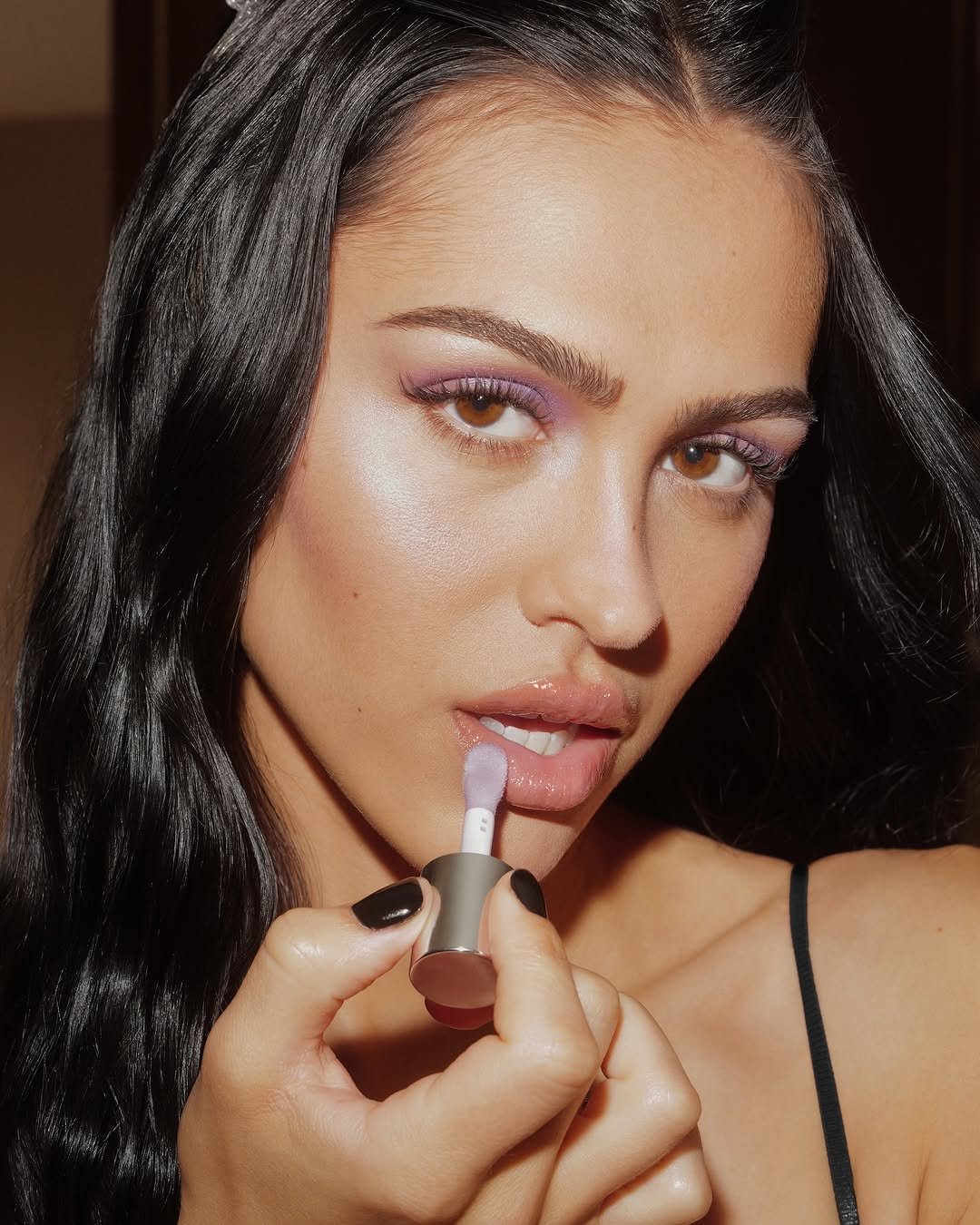 Photo shared by YSL Beauty Official on January 12, 2026 tagging @adrianmartinn, and @ameliagray. May be an image of one or more people, makeup, lipstick, eyeliner, cosmetics and text.