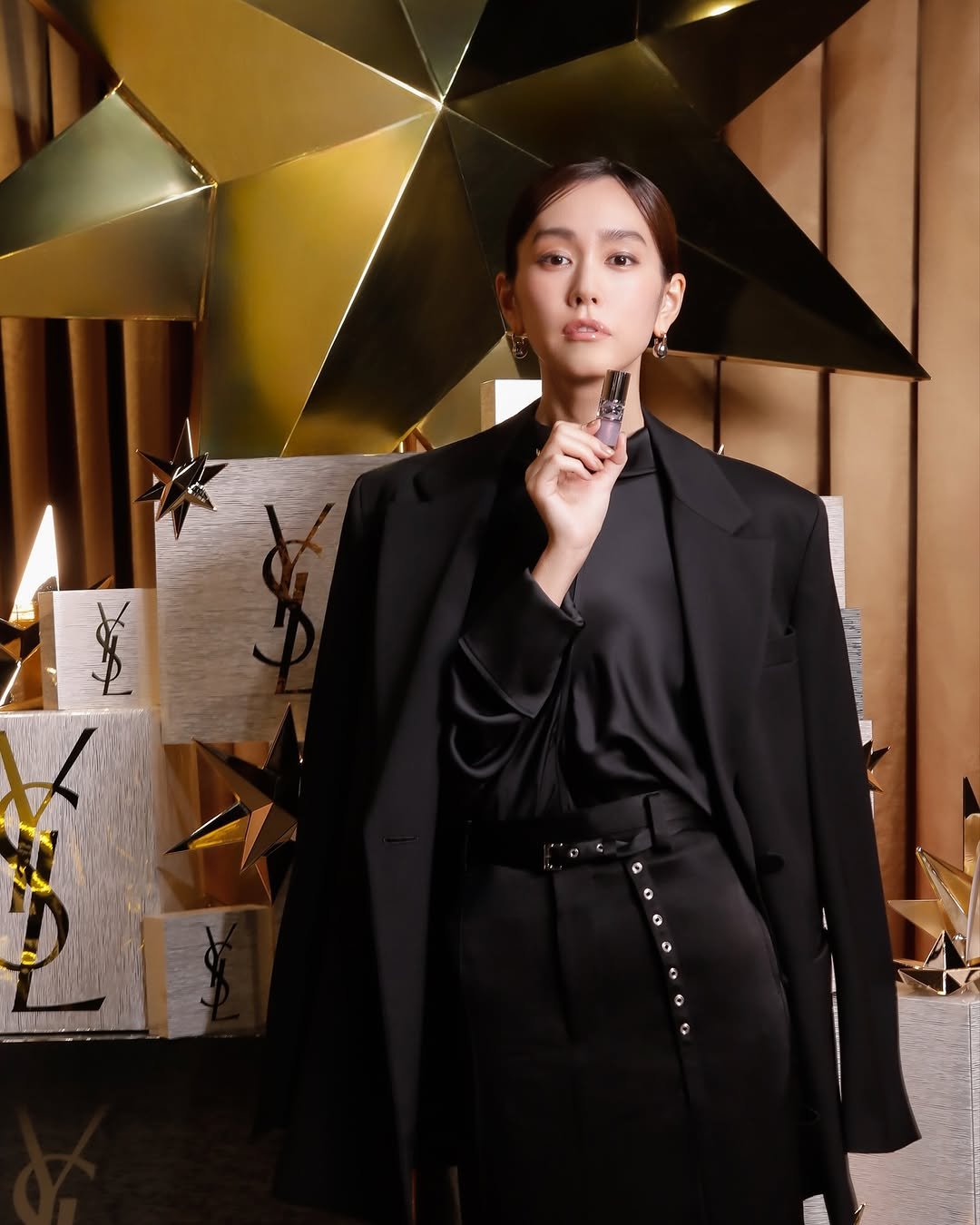 Photo shared by YSL Beauty Official on November 17, 2025 tagging @mirei_kiritani_. May be an image of one or more people, makeup, blazer and text.