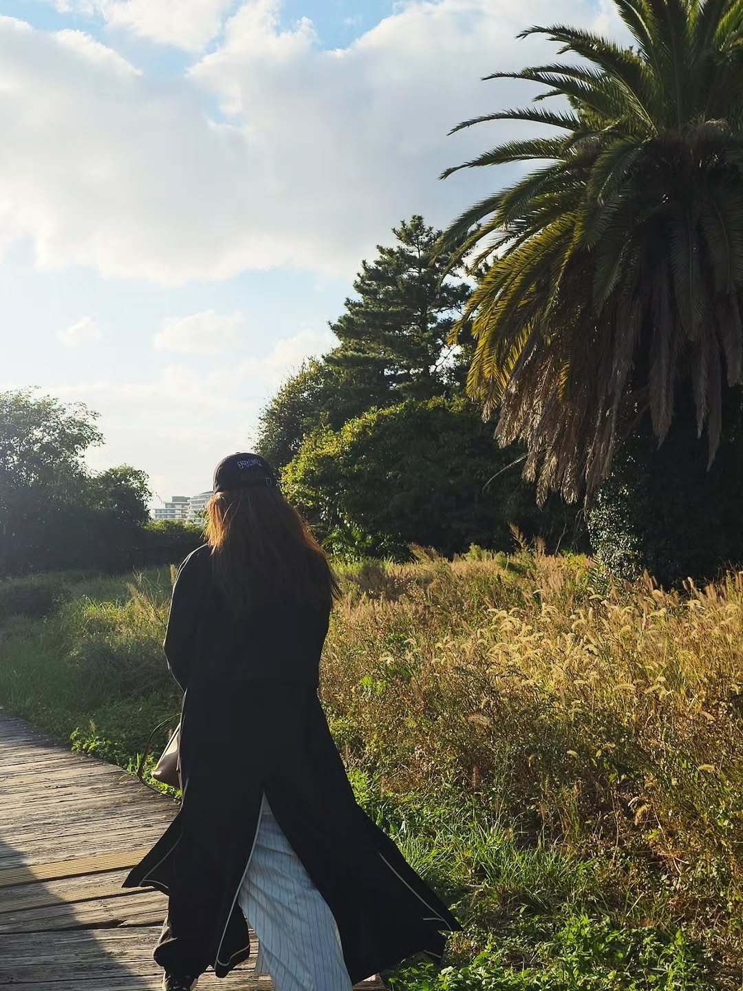 Photo by 소유진 on November 04, 2025. May be an image of headscarf, cloak, outdoors and text.