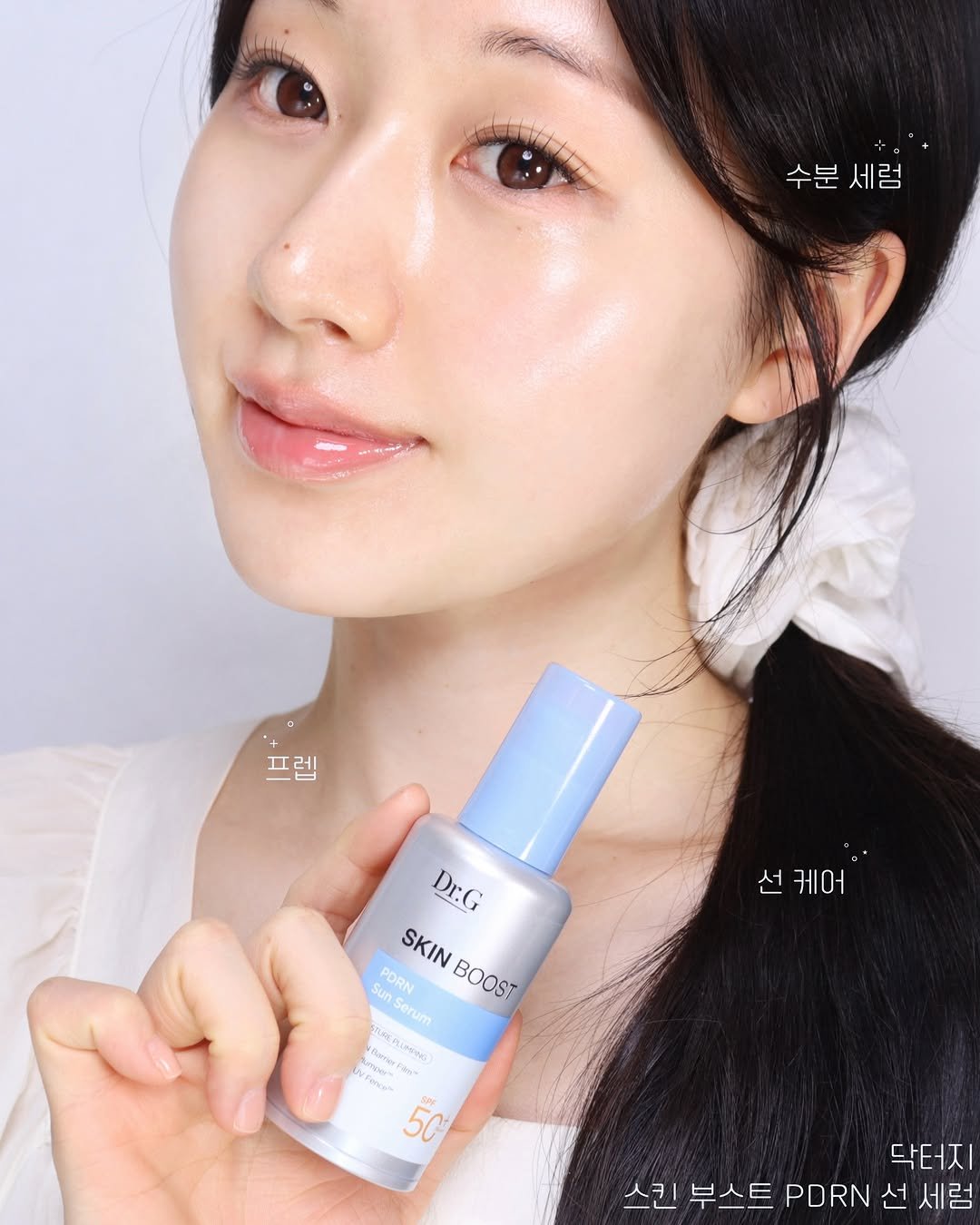 Photo shared by 율리아 𝗬𝗨𝗟𝗜𝗔 on April 26, 2026 tagging @dr.g_official. May be an image of one or more people, makeup, lotion and text that says '수분 수분세럼 세럼 프렘 프렙 선 선케어 케어 Dr.G SKIN Sun วินท Serun Serum Seru erum PORN BOOST ONYN ว raa DEOA фo4Aи 5C 닥터지 스킨 부스트 PDRN 선 세럼'.