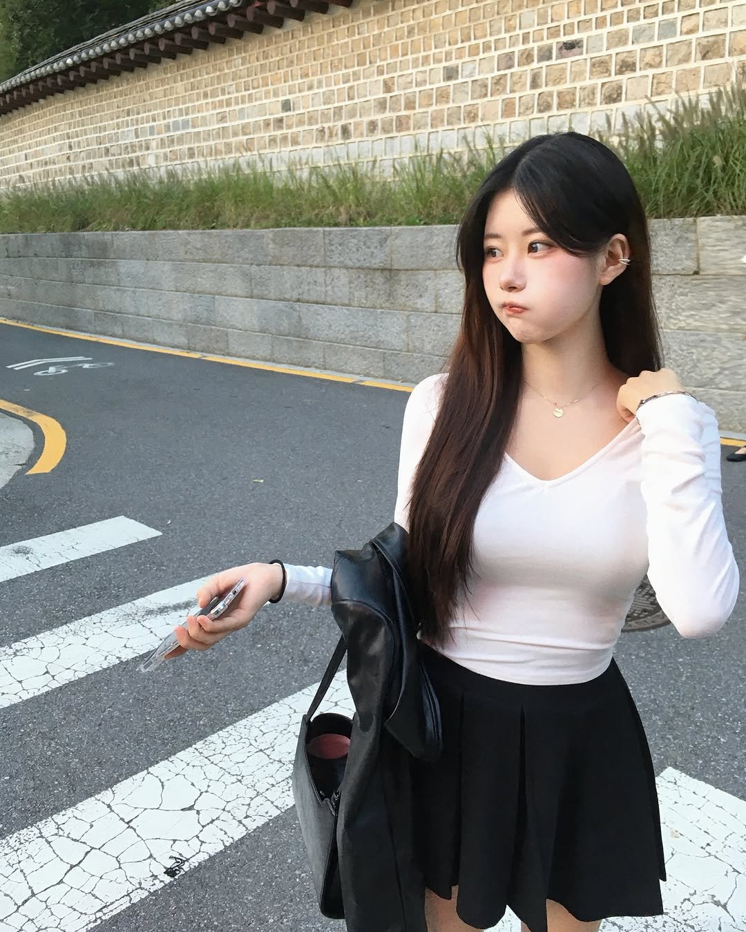 Photo shared by 융덕 on September 28, 2025 tagging @bunny8doll.official. May be an image of 1 person, hair, miniskirt, top and text.