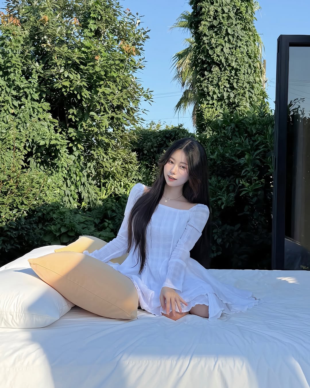 Photo by 융덕 on September 14, 2025. May be an image of 1 person, sleepwear, slip, bed, outdoors and text.