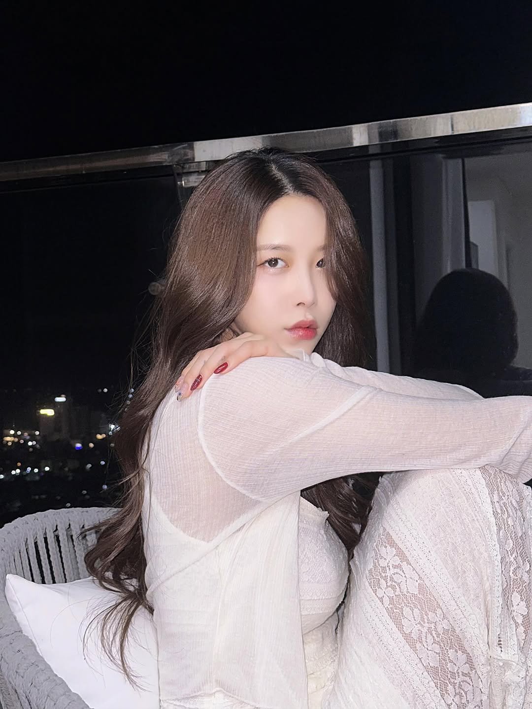 Photo by 이윤우 on December 12, 2025. May be an image of one or more people, hair, slip, sleepwear, bra, top and text.