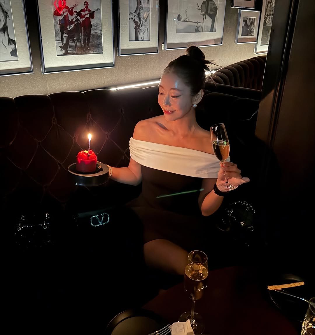 Photo shared by 오유희 유피마켓 on December 13, 2025 tagging @yupiyupi_up. May be an image of one or more people, champagne, candle and text.