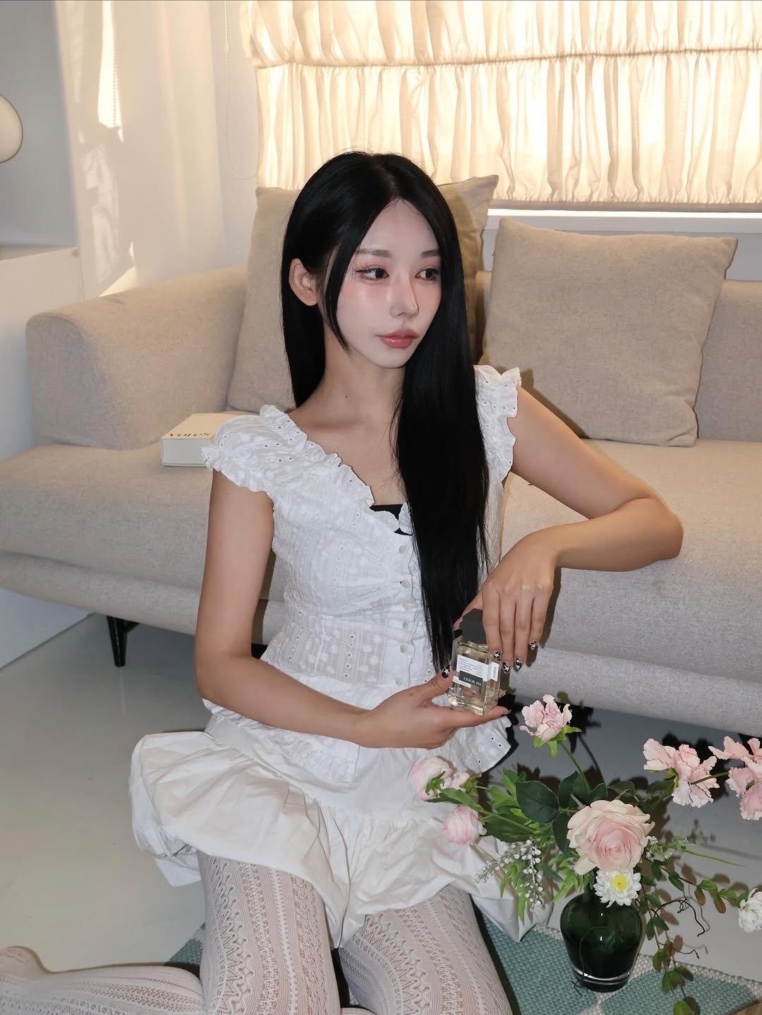 Photo shared by 유라 (李유라) on November 22, 2025 tagging @vores.official. May be an image of slip and sleepwear.