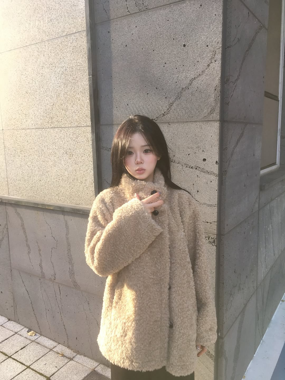 Photo shared by 홍유연 on November 13, 2025 tagging @u_bion_. May be an image of one or more people, hair, duffle coat, goosedown coat, fur coat, overcoat, turtleneck, parka, jacket and text.