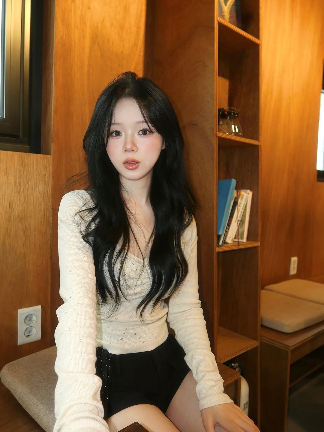 Photo by 홍유연 on September 09, 2025. May be an image of 1 person, hair, miniskirt, top and text.