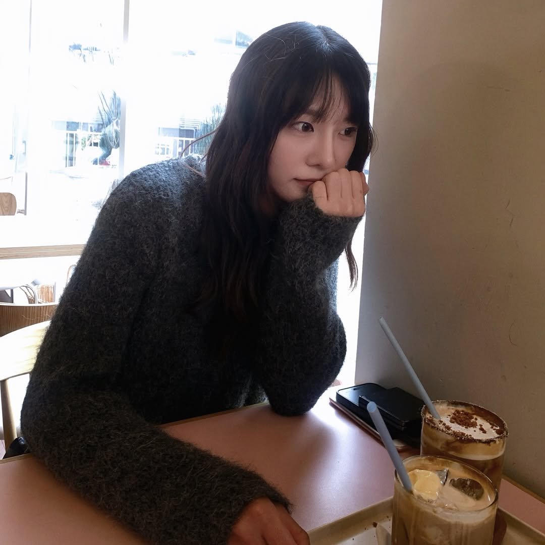 Photo by 하랑 Harang on January 04, 2026. May be an image of one or more people, hair, duffle coat, turtleneck, cornflower and text.