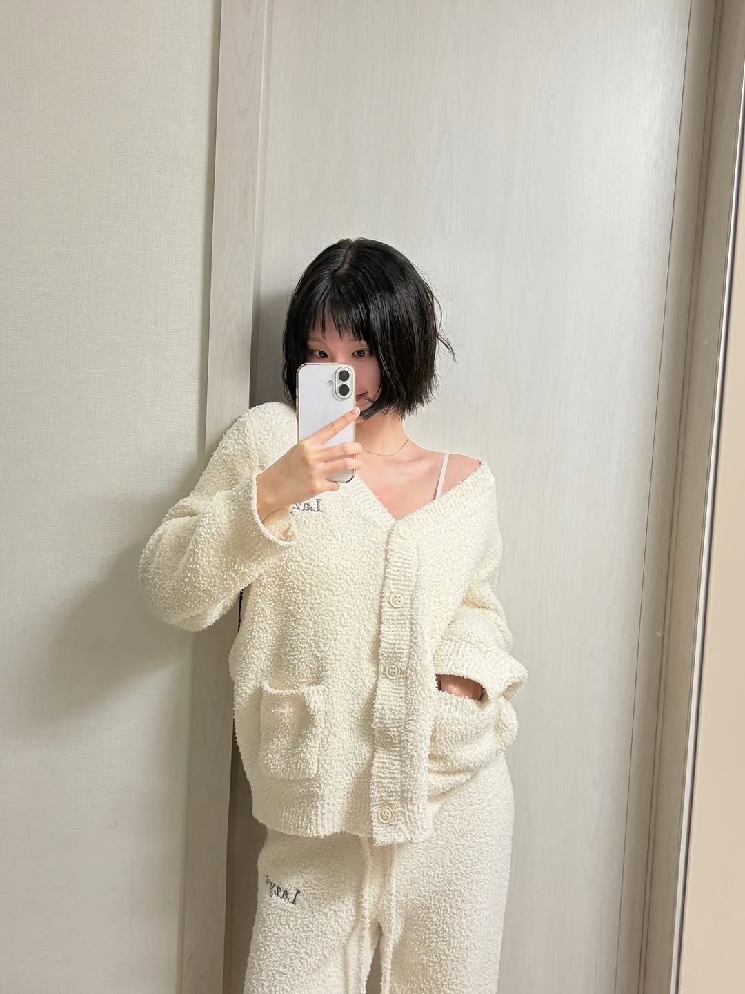 Photo shared by 하여니 on January 17, 2026 tagging @lazyz.official. May be an image of sleepwear, bath robe, robe, sweatpants and text.