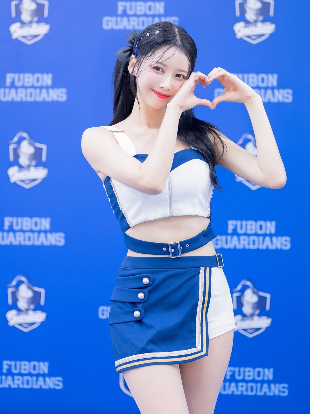 Photo by 이아영 on April 25, 2026. May be an image of costume, miniskirt and text that says 'FUBON GUARDIAN CUARD FUBON UARDIANS IBON ANS poAoKae FUBON JARDIANS FUBON GUARDIANS FUBON JARDIANS FUBON UARDIANS'.