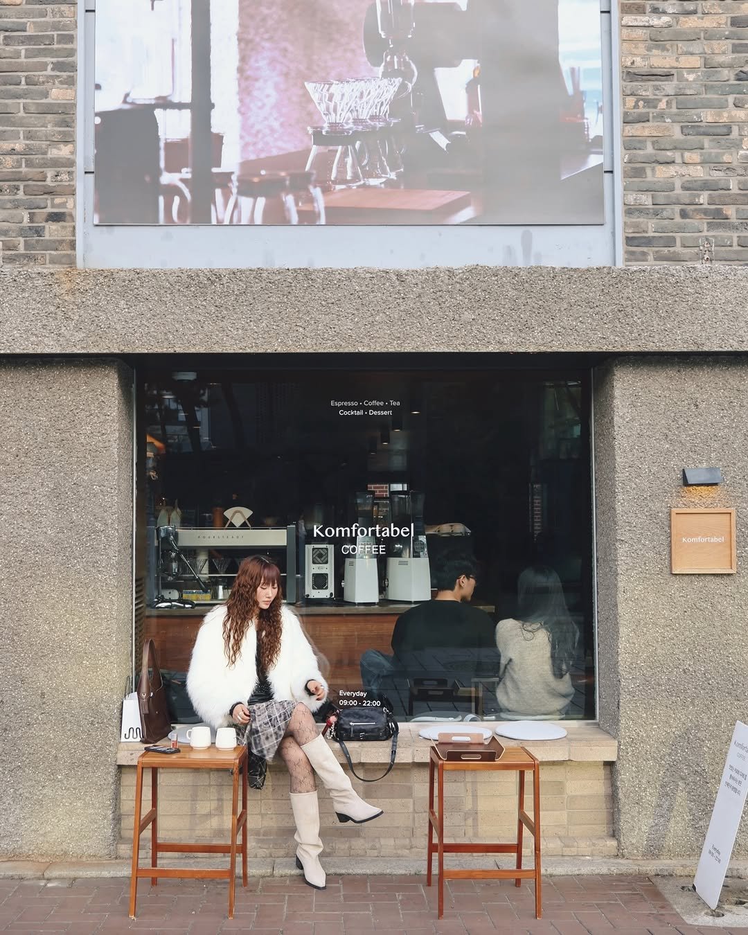 Photo shared by 연재중 on November 23, 2025 tagging @71to96. May be an image of display case, cornflower, brick wall and text.