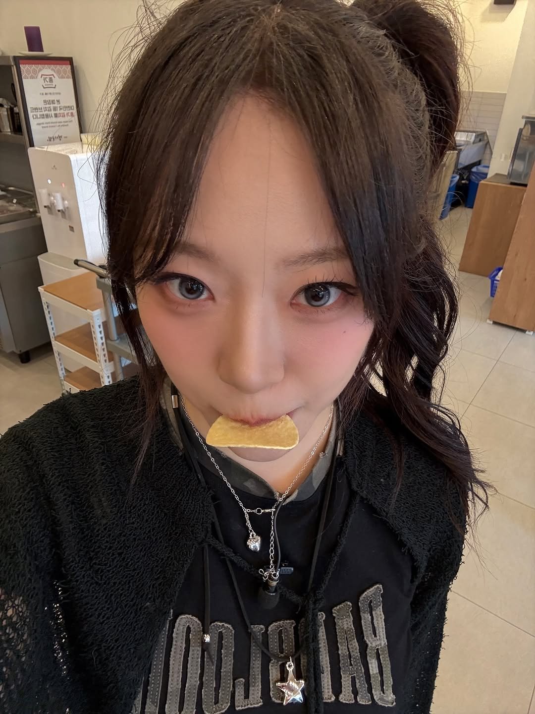Photo by 지원 JEEWON on July 03, 2025. May be an image of 1 person, hair, bread and text.
