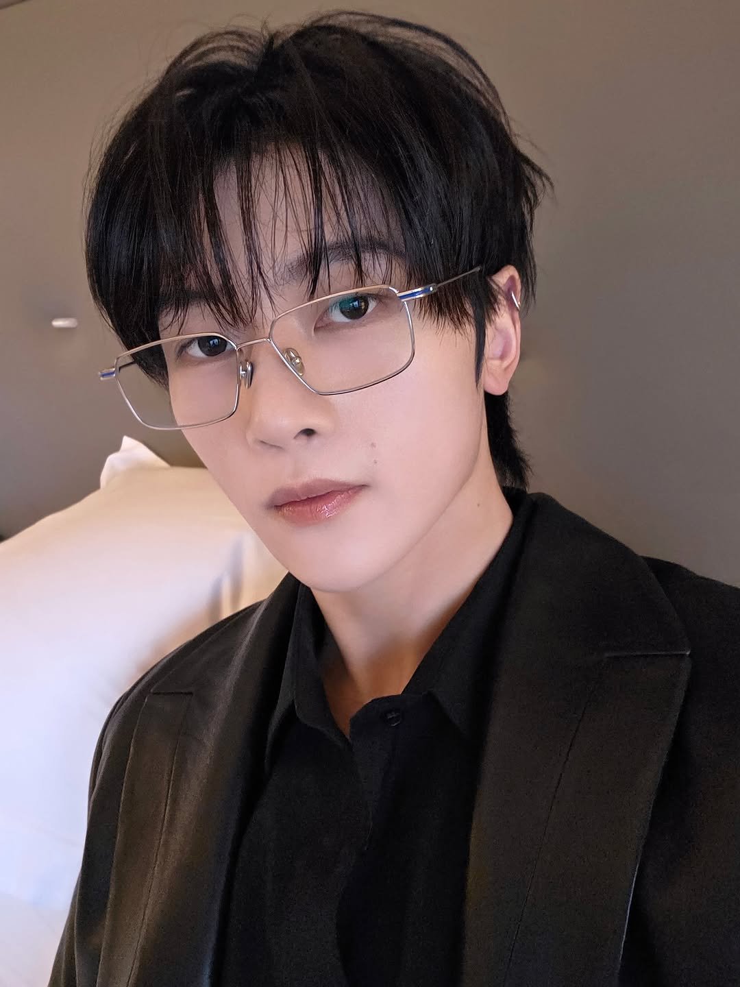 Photo by ZEROBASEONE on December 01, 2025. May be an image of one or more people, bangs, eyeglasses and text.